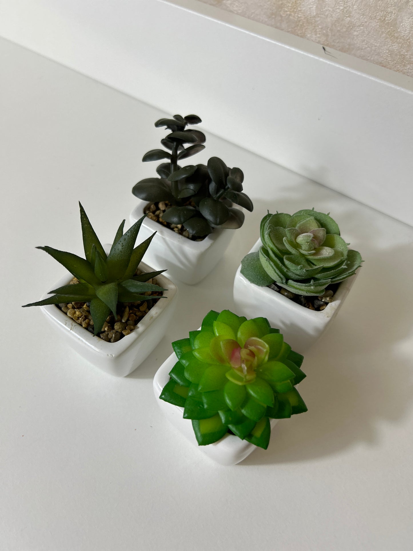 Artificial plastic greenery mini plant set of 4