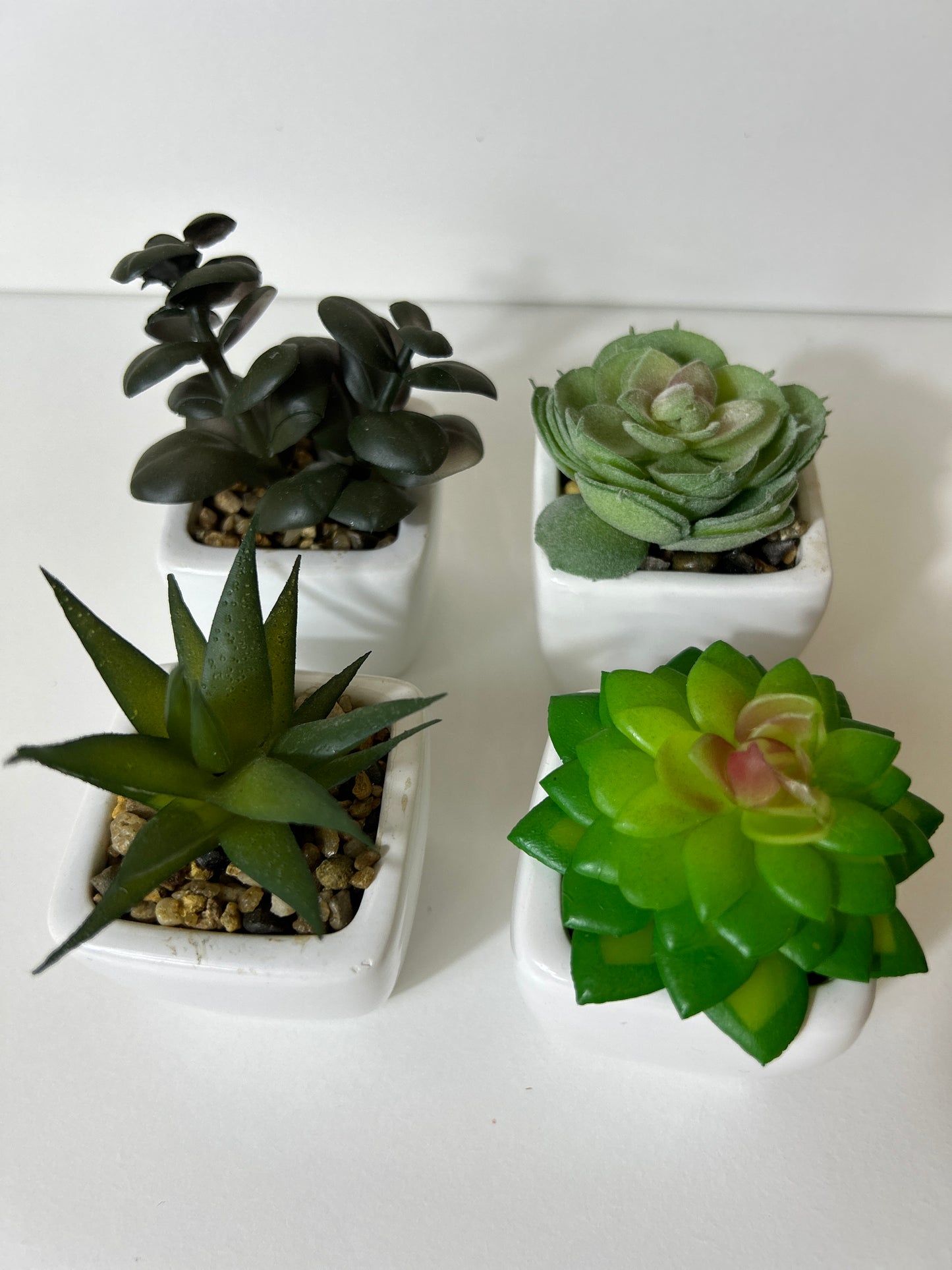 Artificial plastic greenery mini plant set of 4