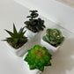 Artificial plastic greenery mini plant set of 4