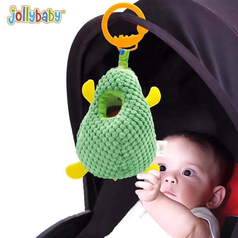 baby holding squshy toy